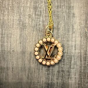 Authentic Gold and pearl LV round necklace